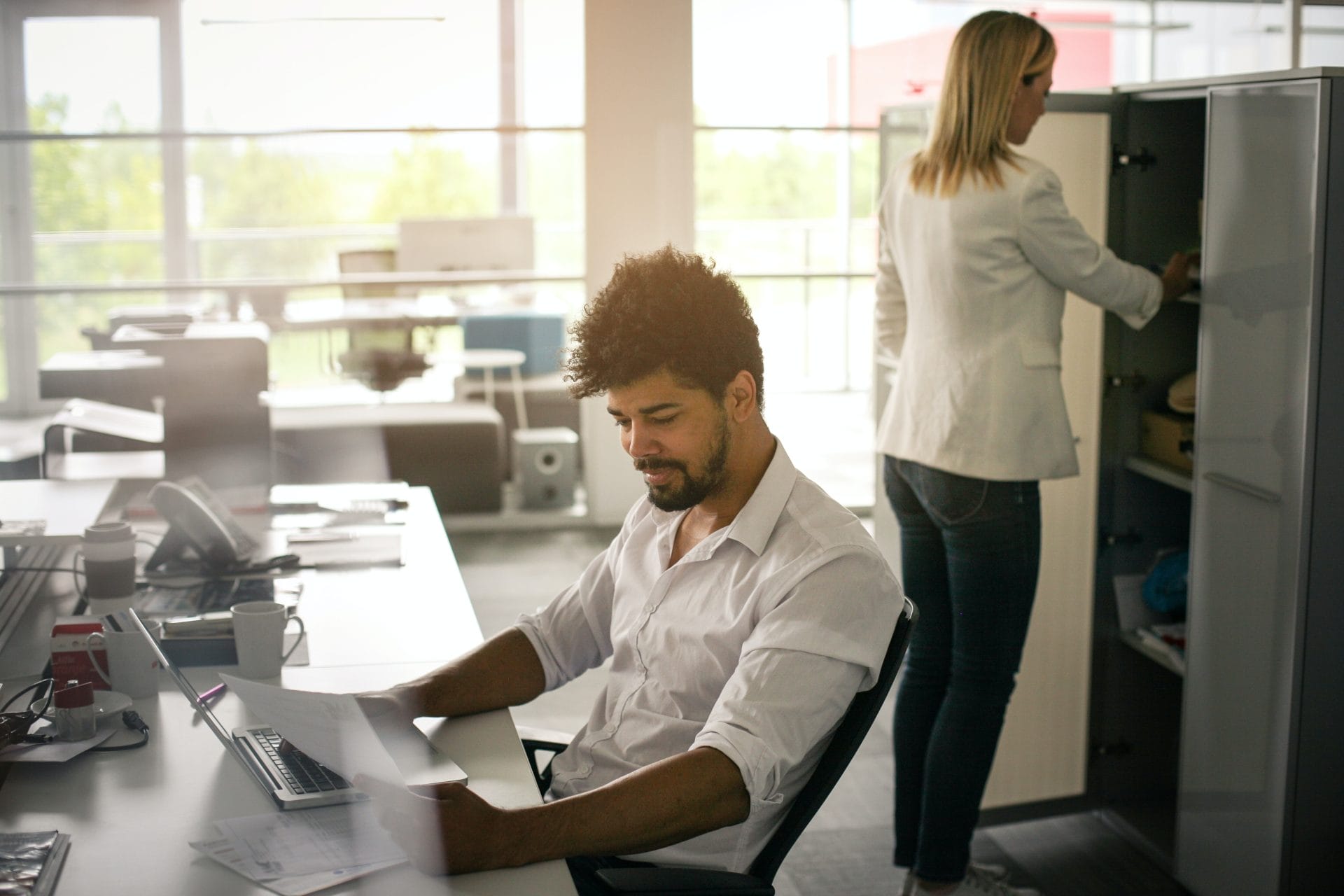 Office with laptops looking for investor